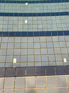 Photo of tiled stairs in a pool